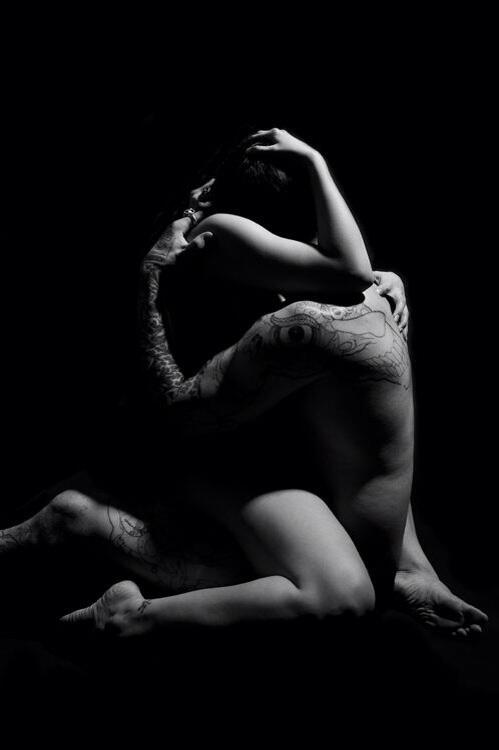 lovers entwined with the heat of desire, the pulsing rush of longing and the promise of blissful oblivion
